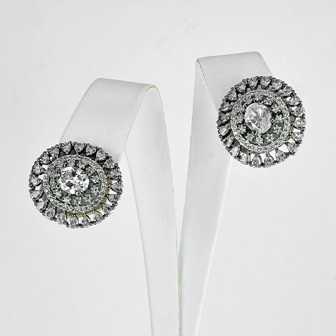 (Circlet Charm earrings (white)) shown in close up from Al Musk Jewellery collection.