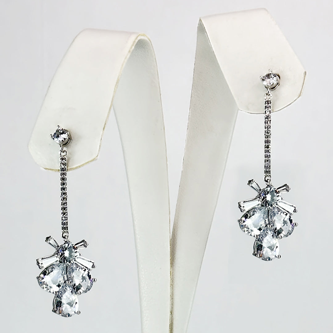 (Bowed Elegance Dangle) shown in close up from Al Musk Jewellery collection.