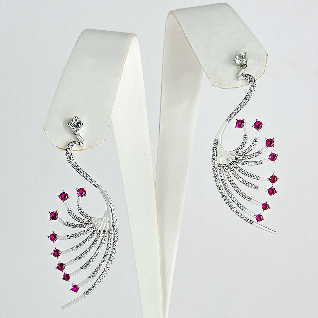  (Pink silver peacock earrings) shown in close up from Al Musk Jewellery collection.